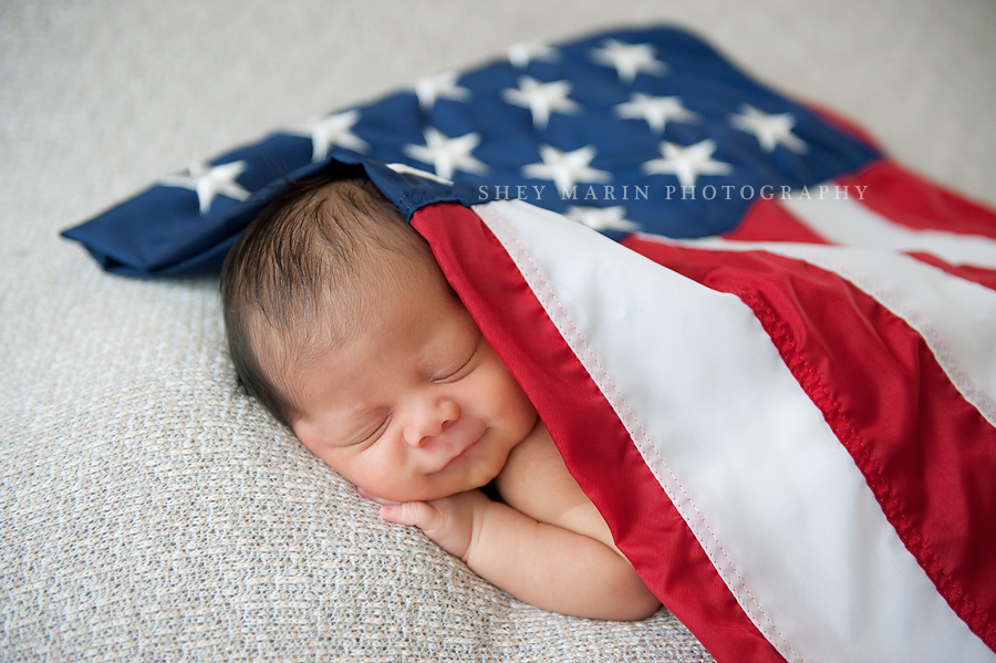 newborn baby and american flag