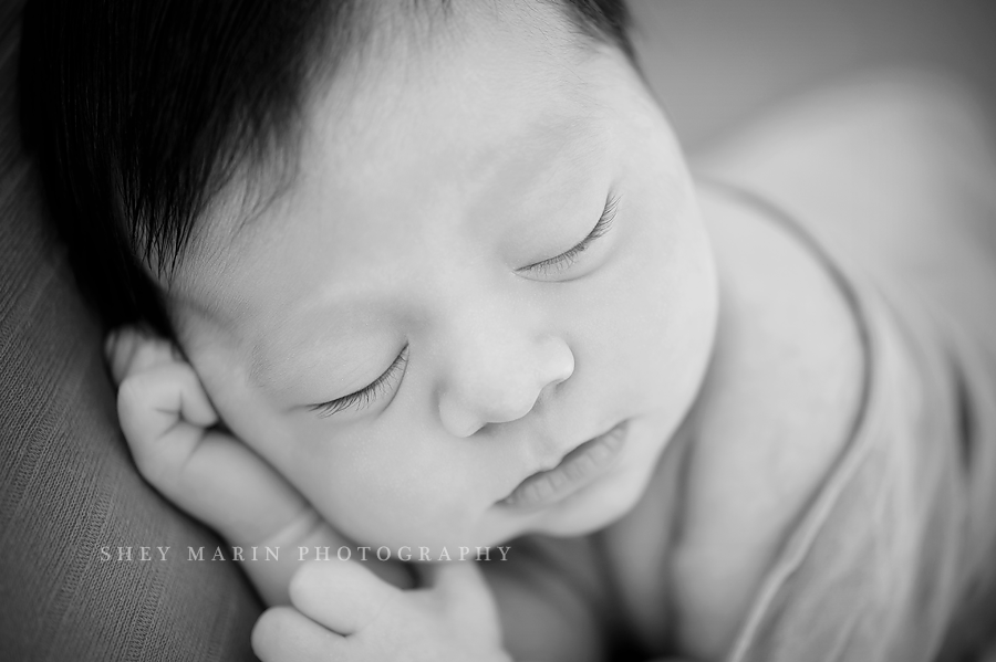black and white closeup of a newborns face