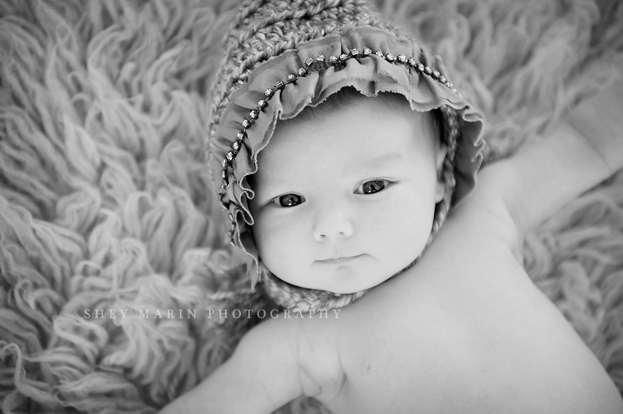 black and white photo of baby girl