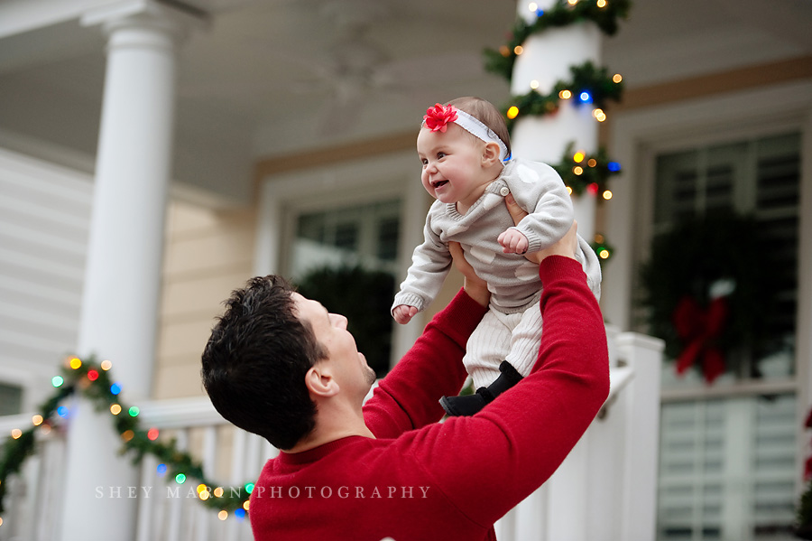 Dad and daughter with Christmas lights