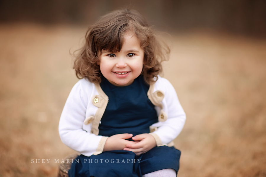 beautiful little girl smiling in winter