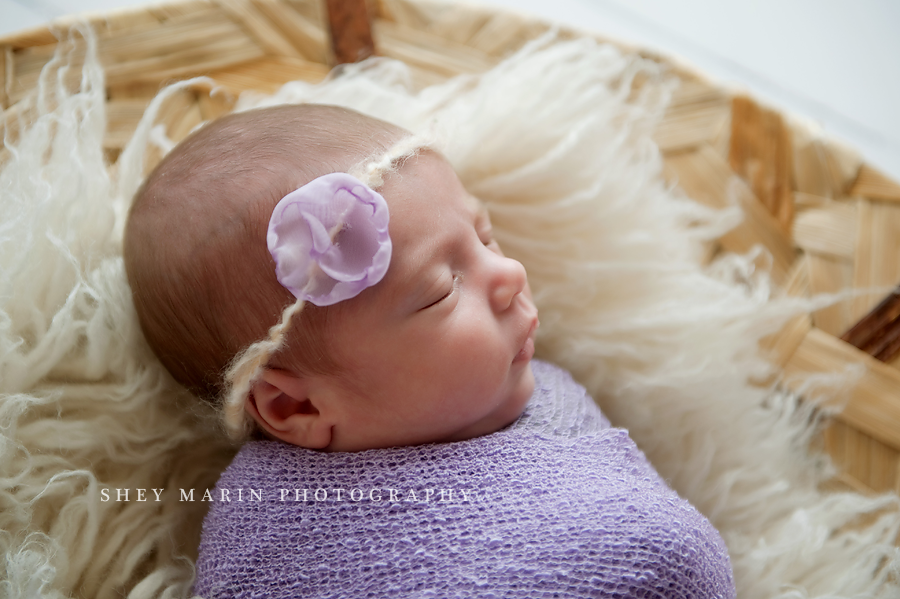 baby girl in purple headband