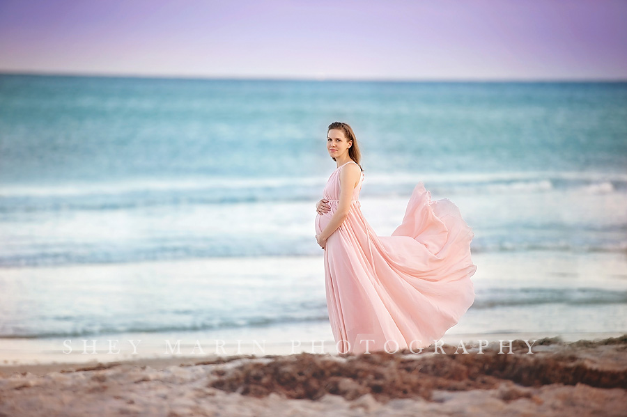maternity session at the beach at sunset