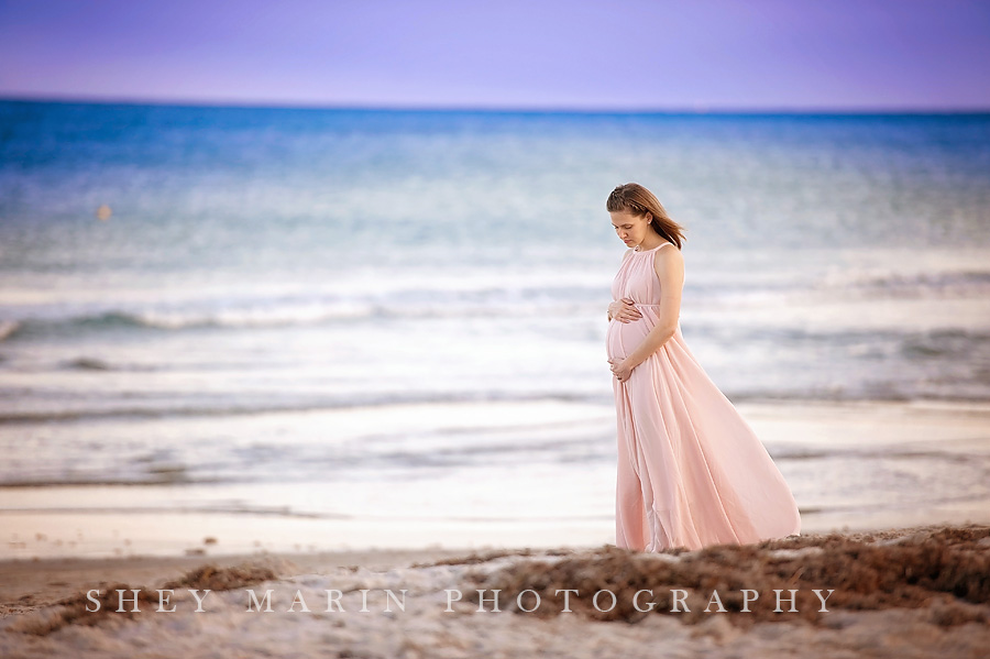 maternity photo in the ocean