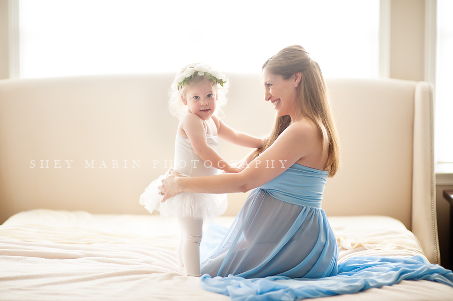 pregnant mother with daughter ballerina