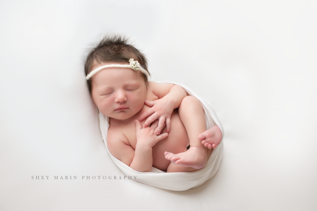 baby girl in white | Frederick Maryland newborn photographer 