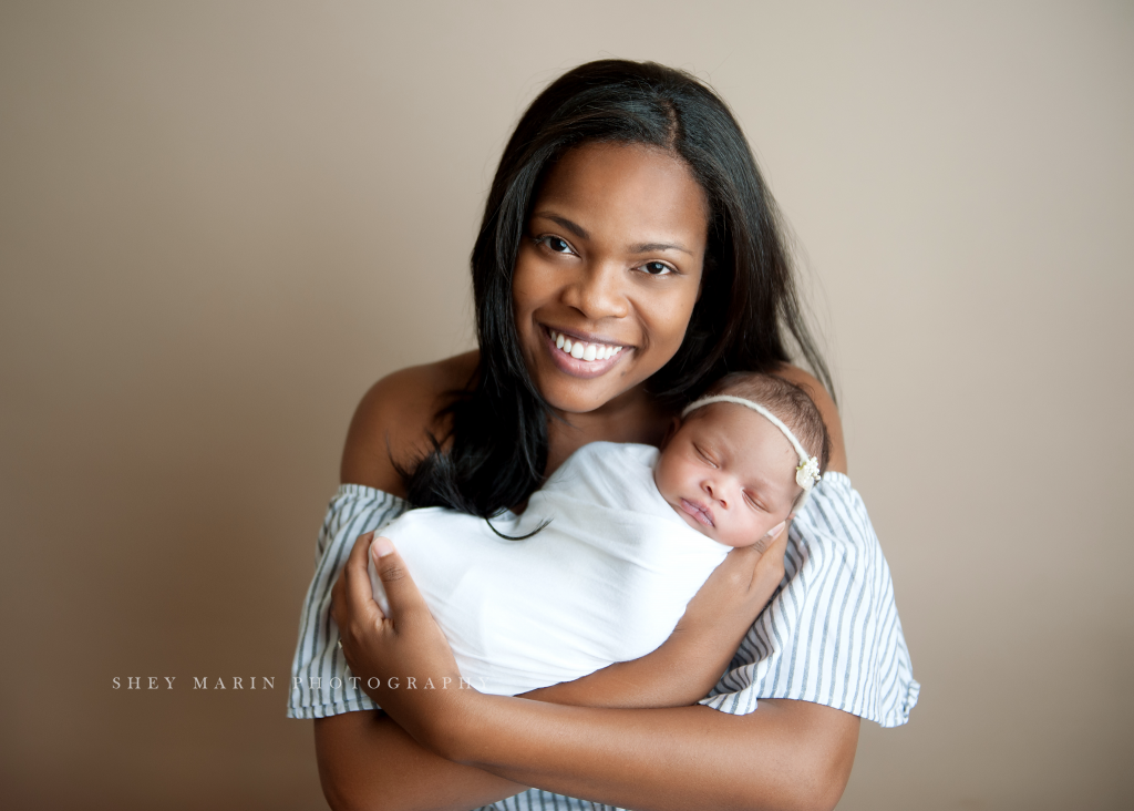 mommy holding baby girl | Washington DC newborn photographer