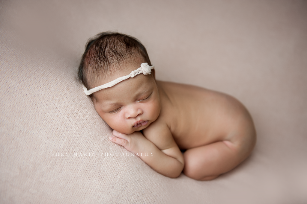 baby girl with headband | Washington DC newborn photographer