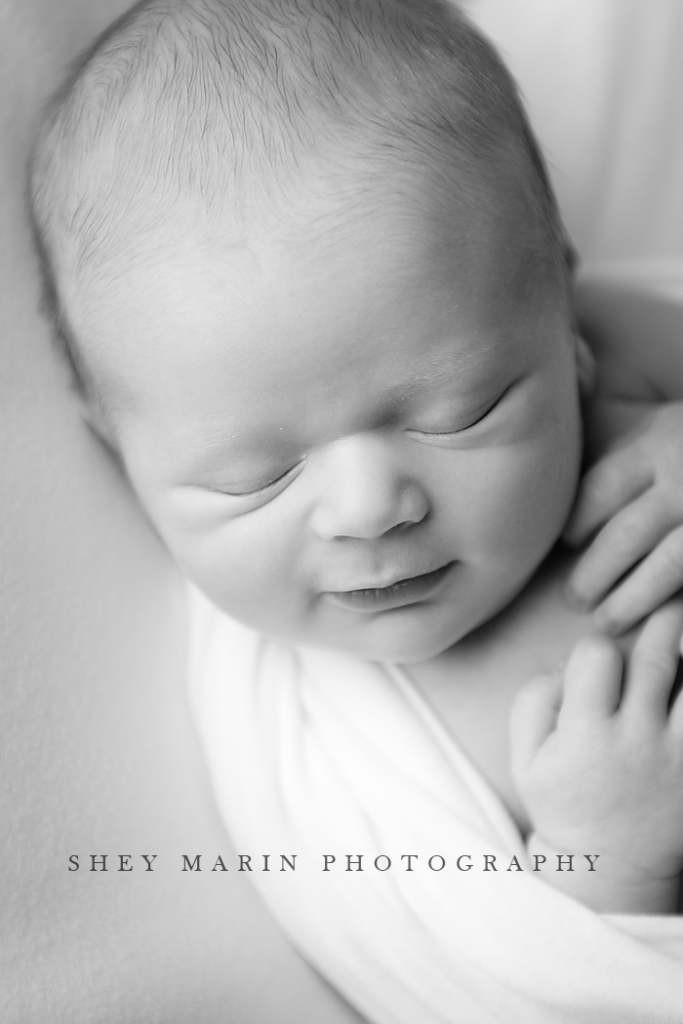 black and white close up of newborn baby boy