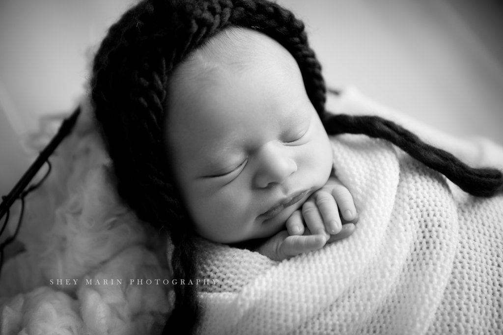 newborn baby boy in black and white