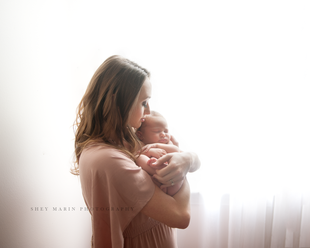 Frederick Maryland newborn baby photographer | nephew baby held by mother