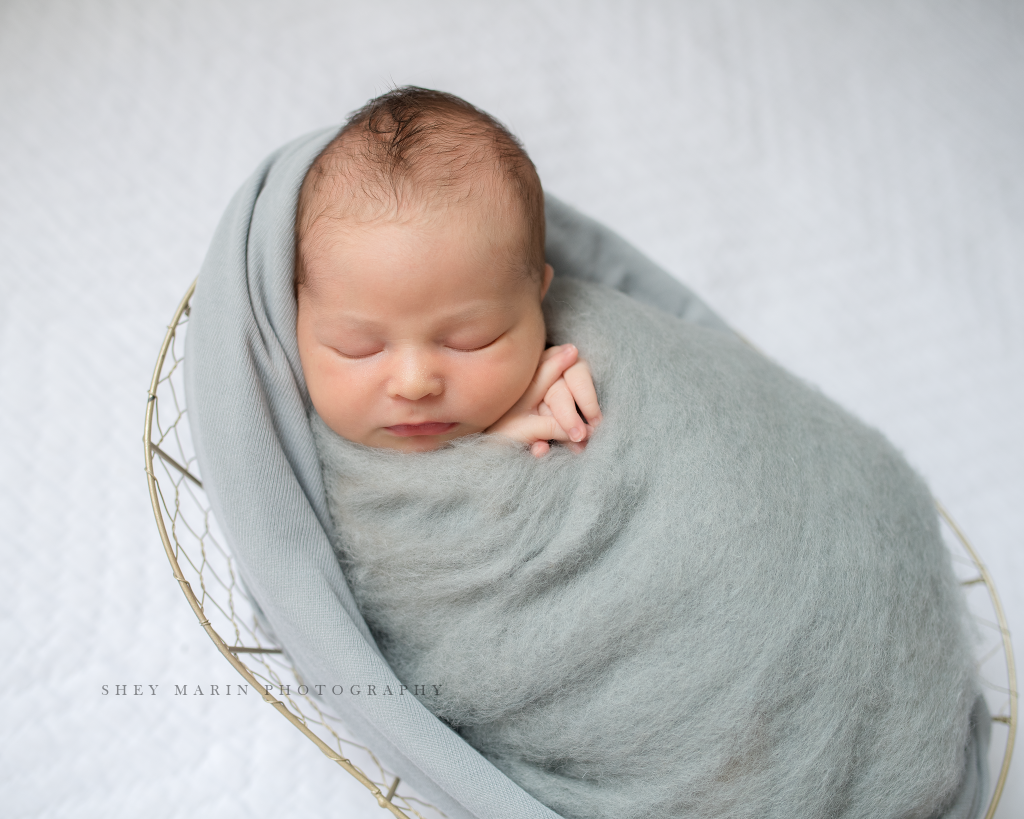 Frederick Maryland newborn baby photographer | nephew baby in basket