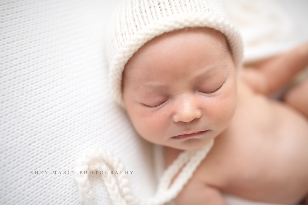 Frederick Maryland newborn baby photographer | nephew baby face