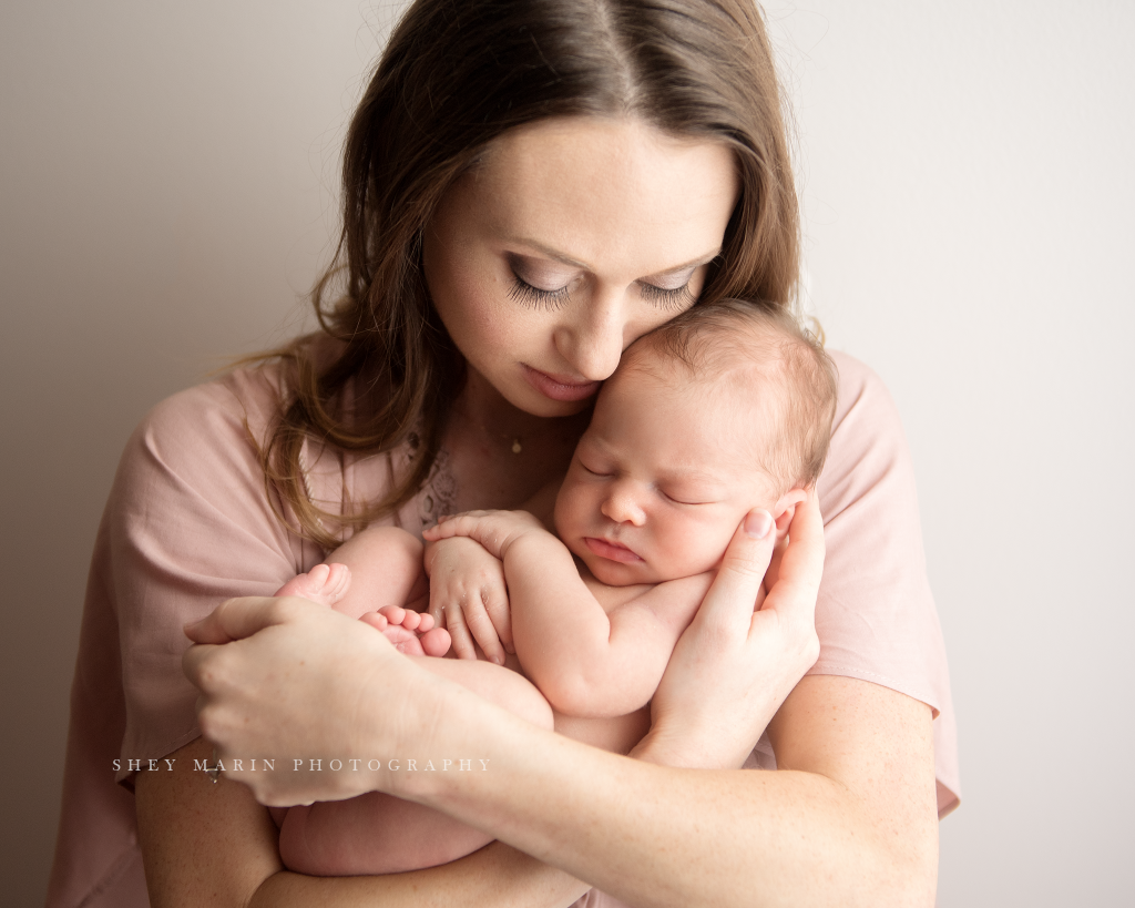 Frederick Maryland newborn baby photographer | nephew baby held by mom