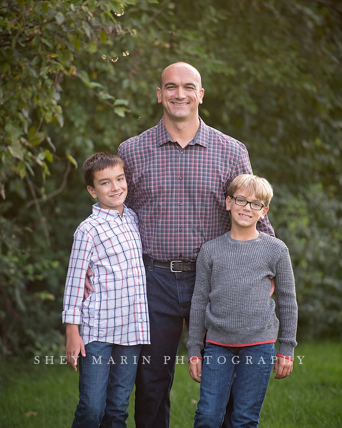 Frederick Maryland children and father photographed in meadow
