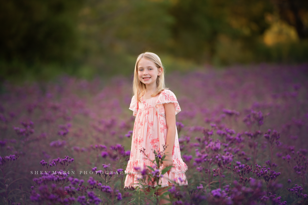 purple wildflower fields with two siblings | Frederick Maryland photographer