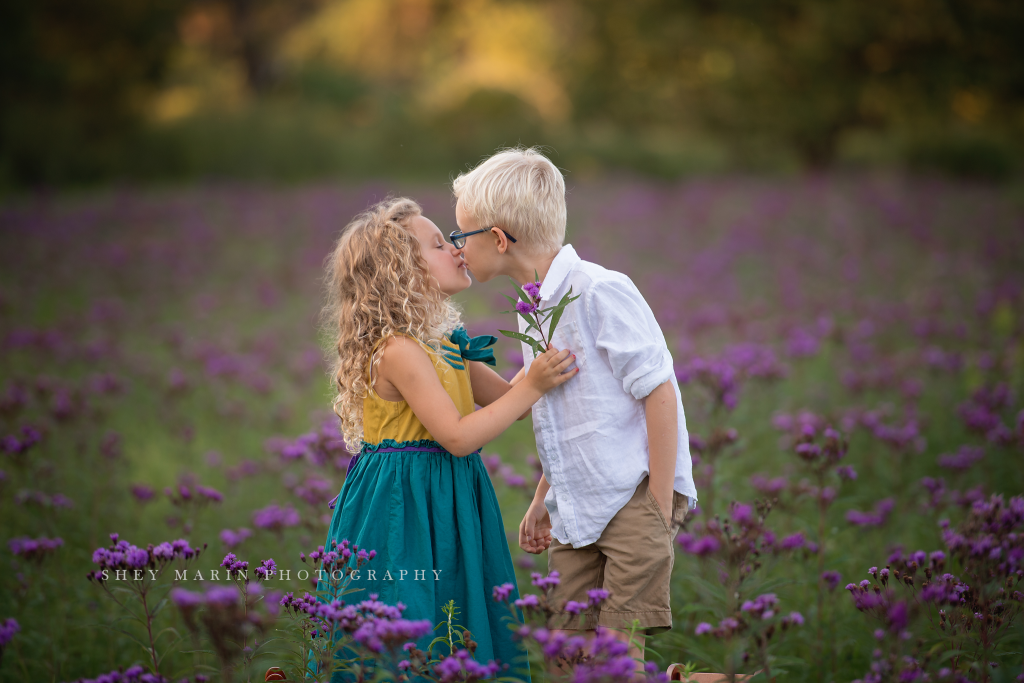 purple wildflower fields with two siblings | Frederick Maryland photographer
