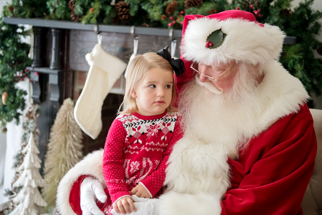 Santa Claus and unsure child Frederick Maryland photographer