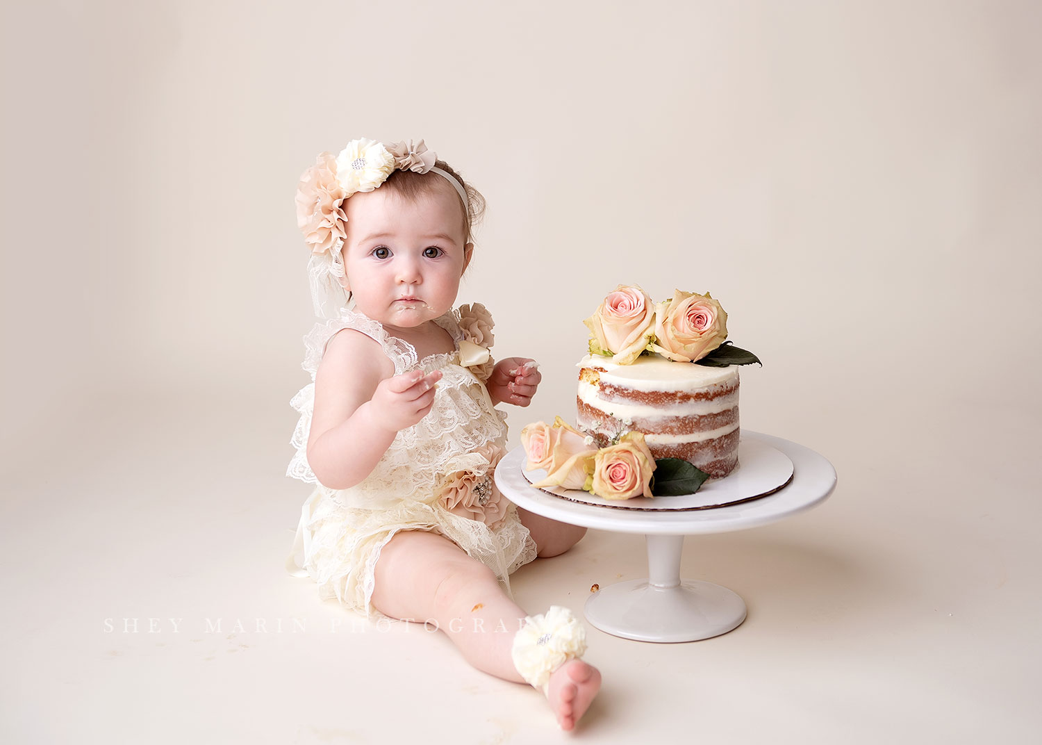 cake smash first birthday photo session