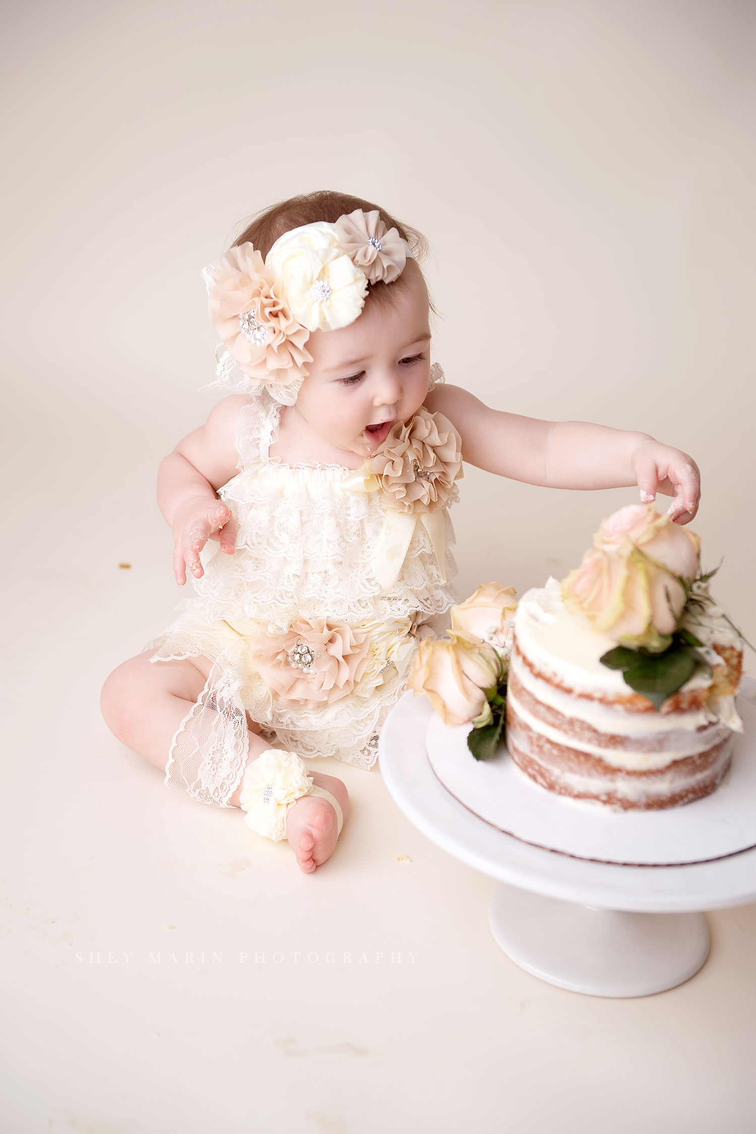 cake smash first birthday photo session