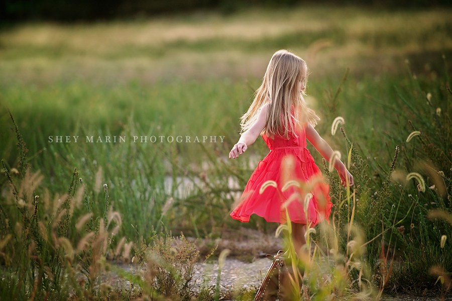 girl in red dress dancing