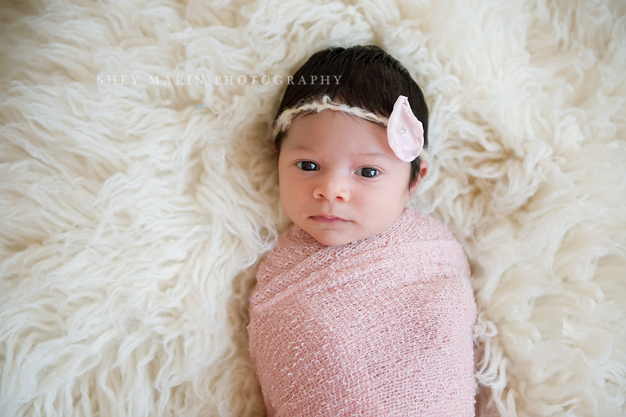 newborn girl in pink