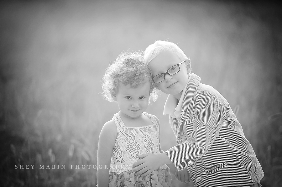 black and white photo of brother and sister