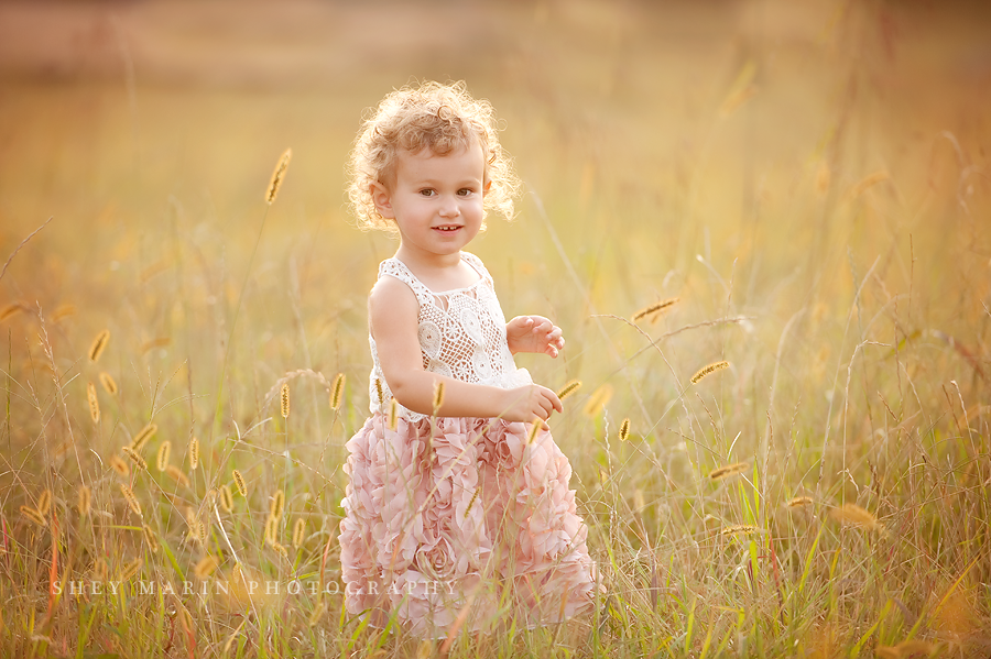 girl smiling at sunset