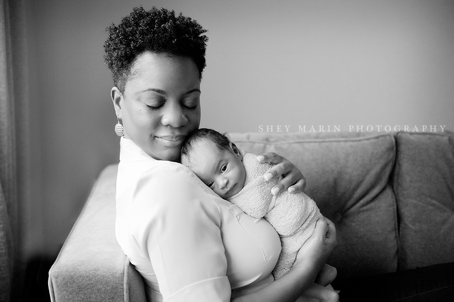 black and white photo of mother holding daughter