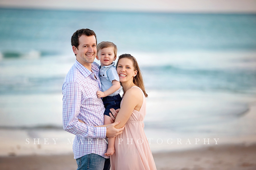 family at sunset at the beach