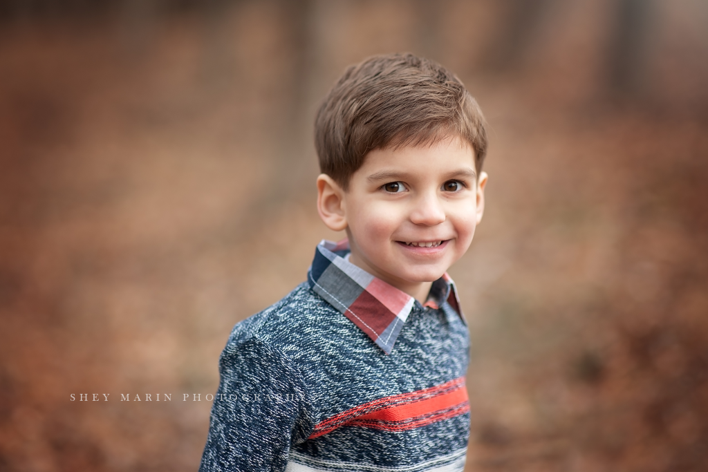 boy and family in forest | frederick family photographer