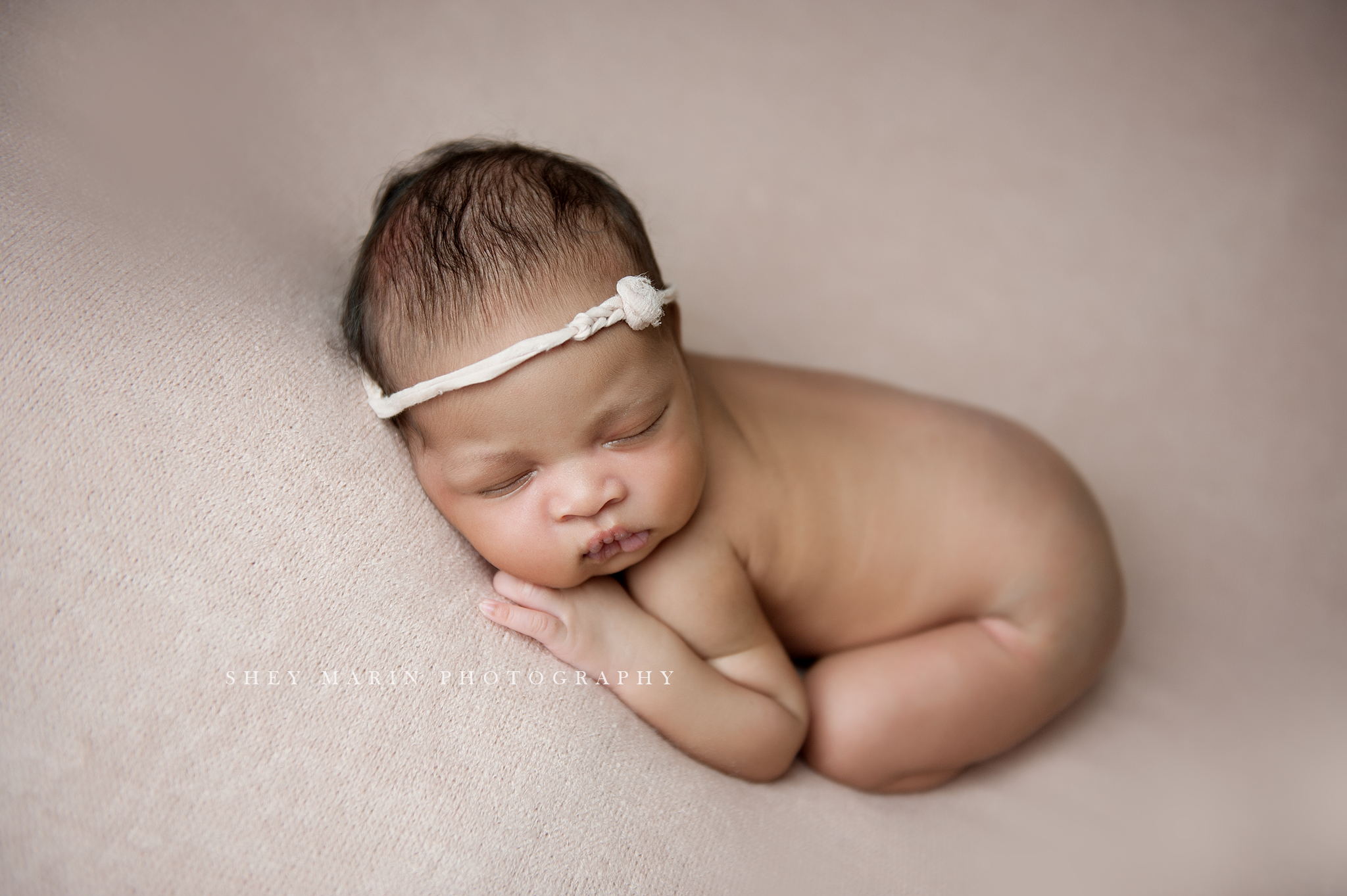 baby girl with headband | Washington DC newborn photographer