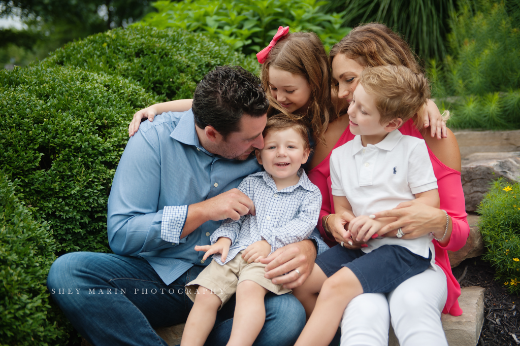 Frederick family in front of beautiful home