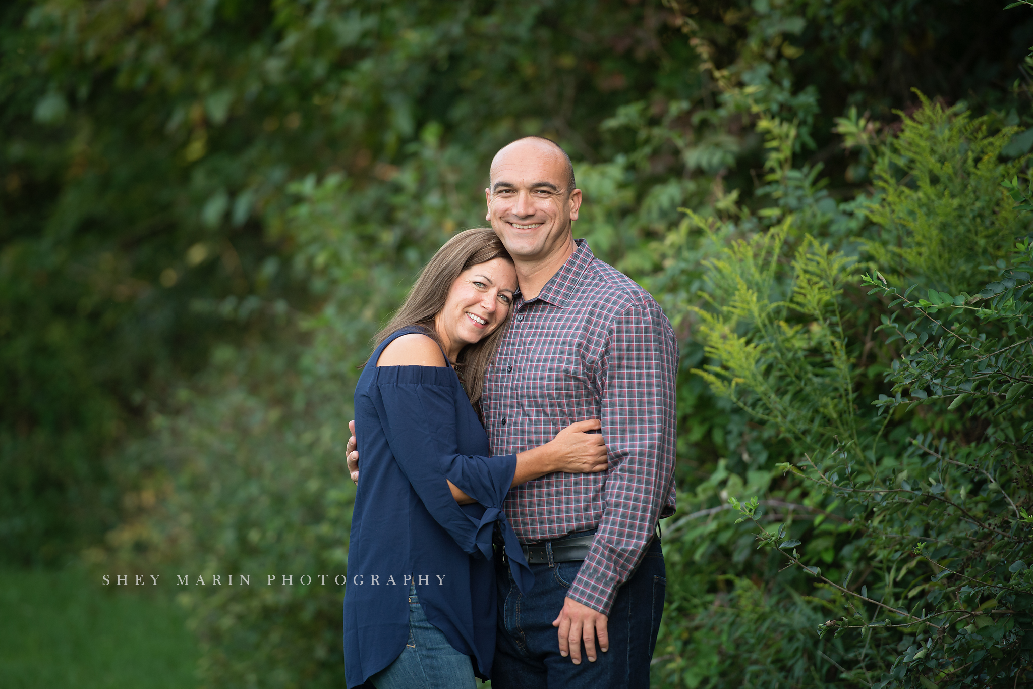 Frederick Maryland couple photographed in meadow