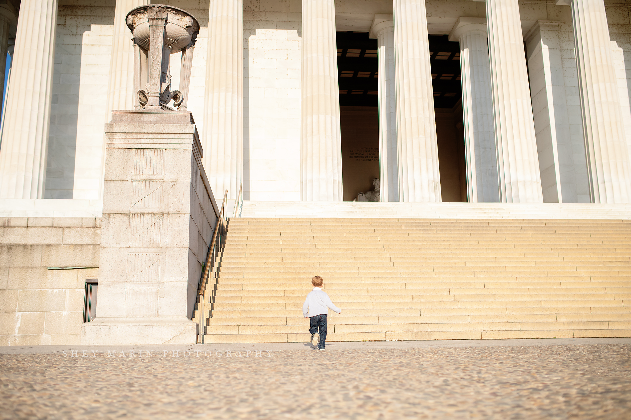 Lincoln memorial boy running up stairs
