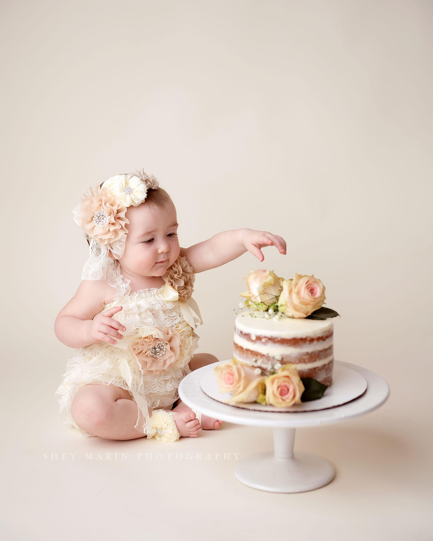 cake smash first birthday photo session