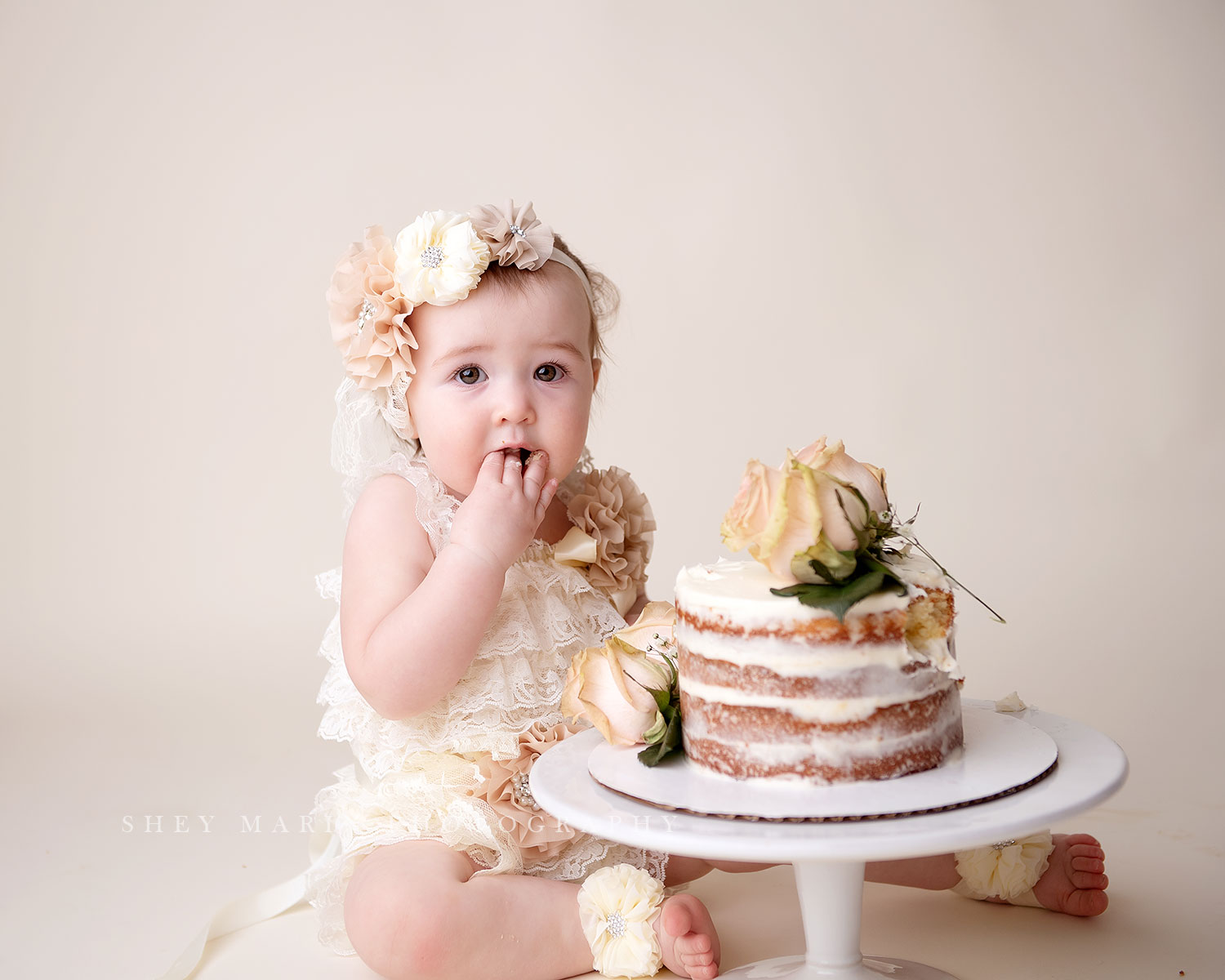 cake smash first birthday photo session