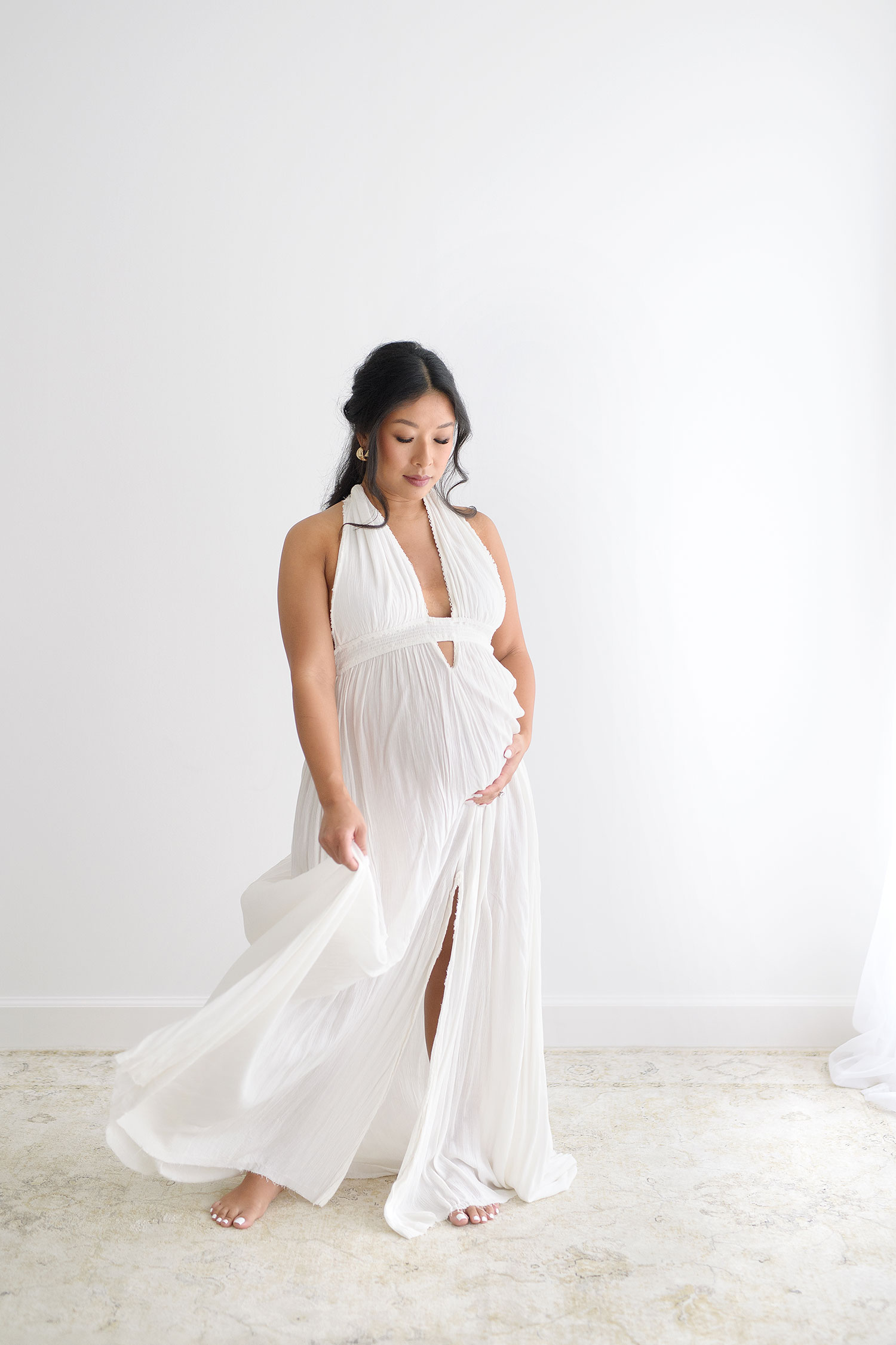 beautiful maternity session with a flowing dress